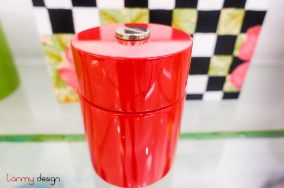 Red round pillar with silver handle